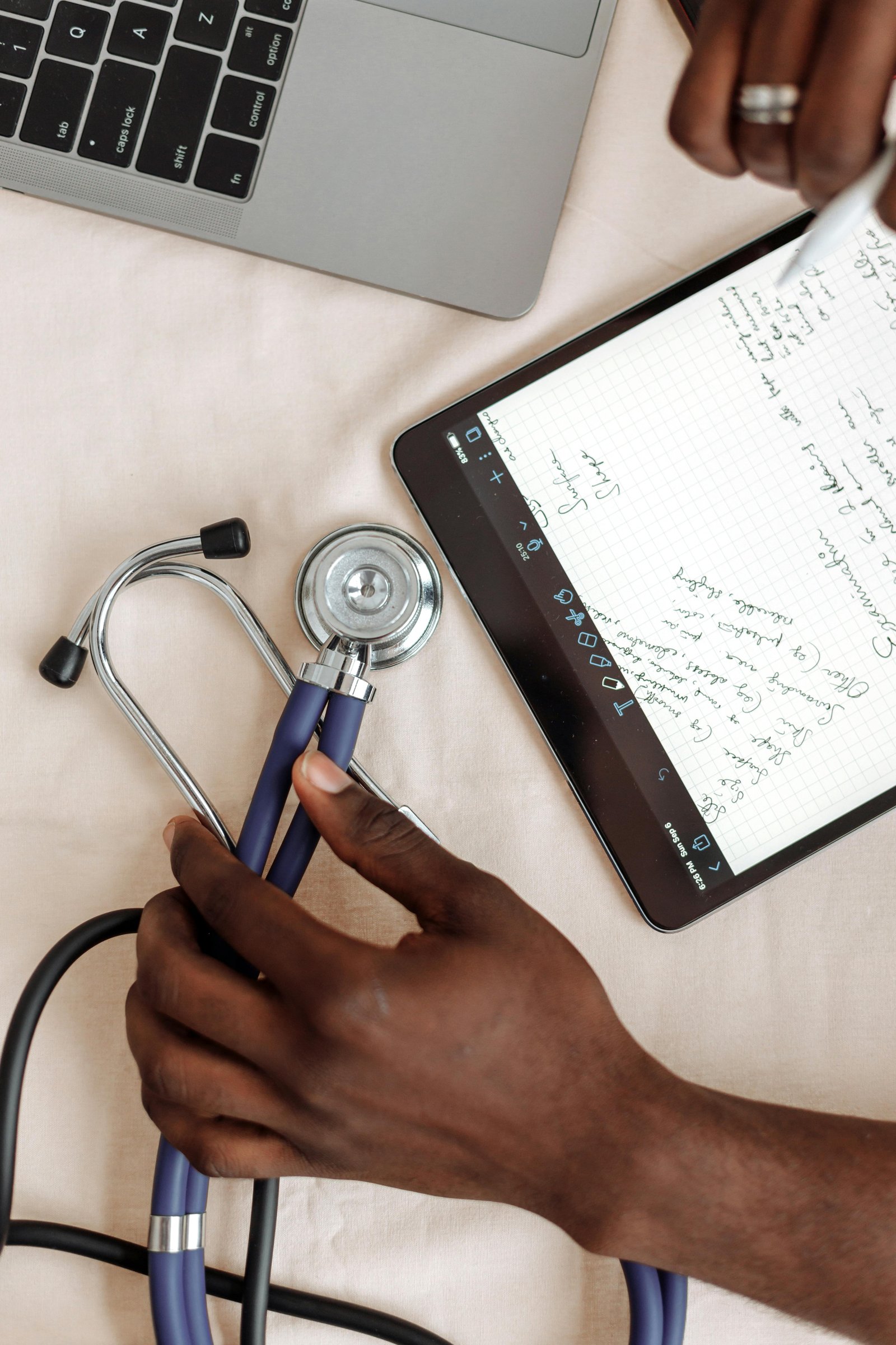 Nursing student studying at desk.